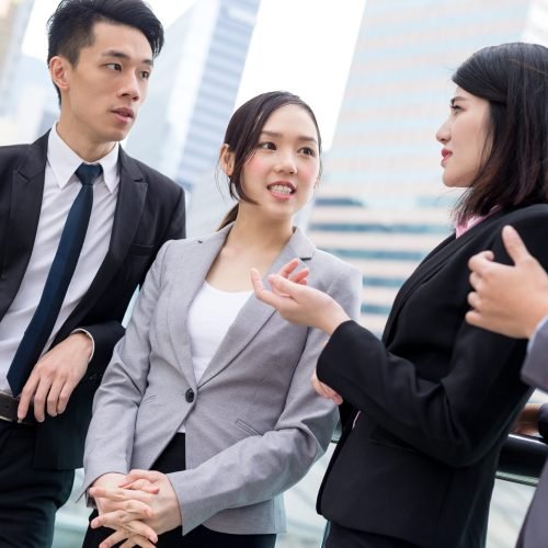 Business people talk to each other